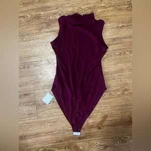 New with tags turtleneck bodysuit